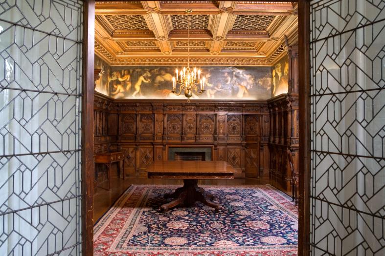 A.D. White House intior room with rich wood detail. 