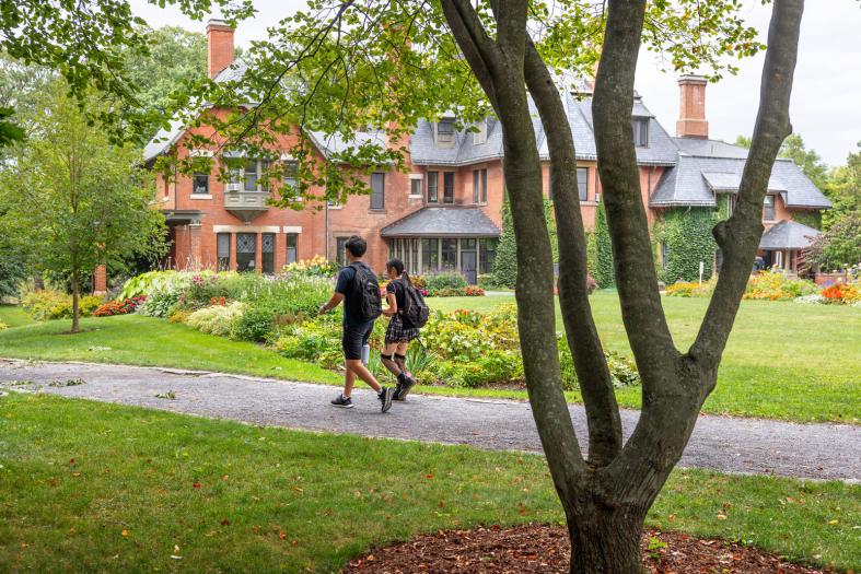 Students walking past A.D. White House