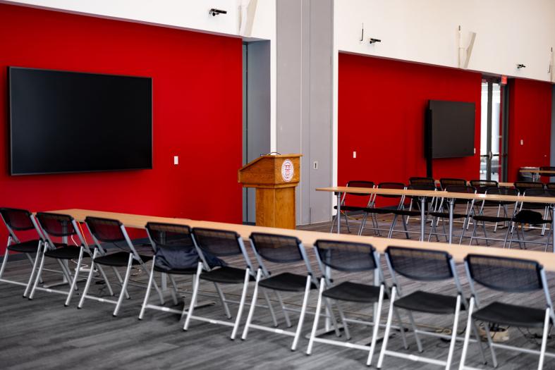 Chairs, tables, and TV monitors in Toni Morrison Hall.