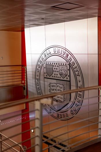 Stairway and Cornell seal in the Robert Purcell Community Center.