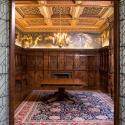 A.D. White House intior room with rich wood detail. 