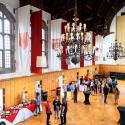 Willard Straight Hall Memorial Room with a catering and cocktail tables.