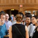 Gathering of people in Willard Straight Hall Memorial Room