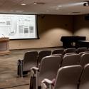Robert Purcell Auditorium with theatre seating and a presentation screen.